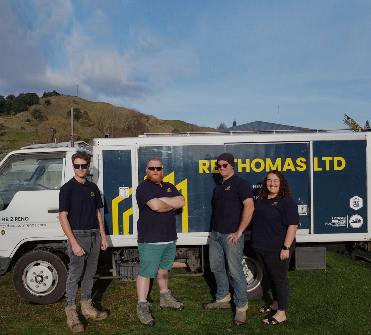The RB Thomas team in branded polos in front of the company truck, Waikato hills behind