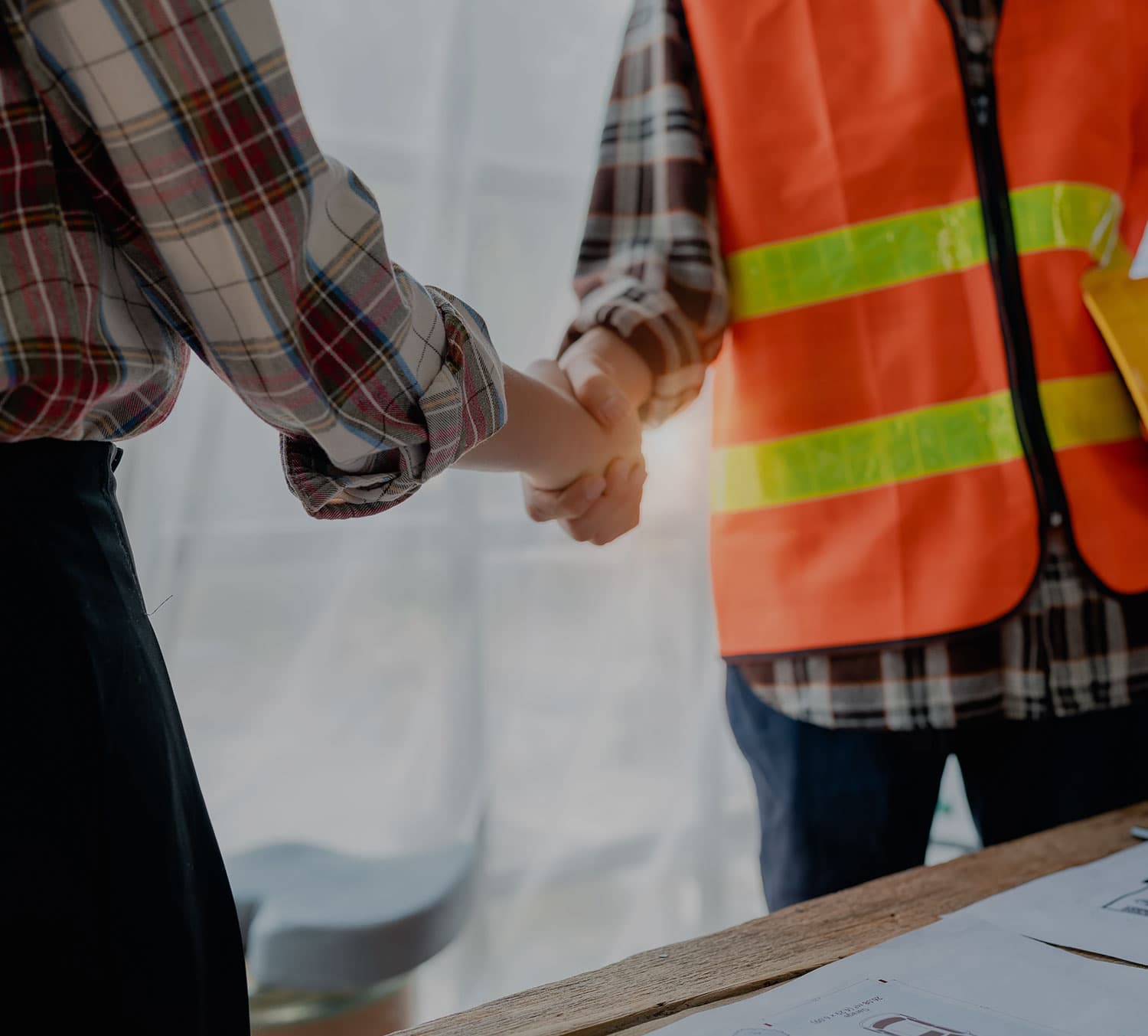 RB Thomas builder meeting a client on site