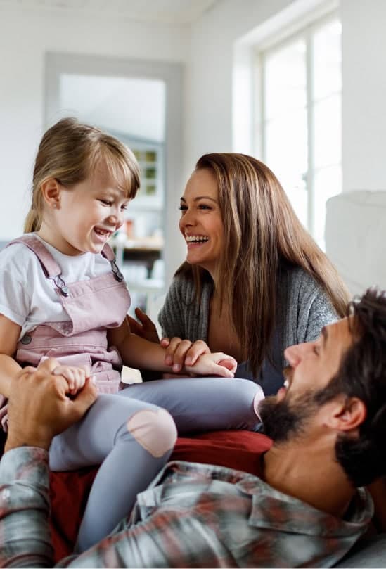 A family relaxing together in their renovated home