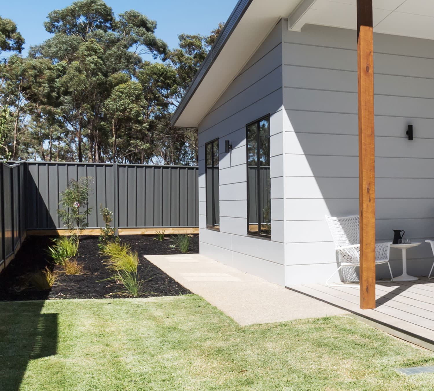 Home with fresh grey weatherboard cladding by RB Thomas